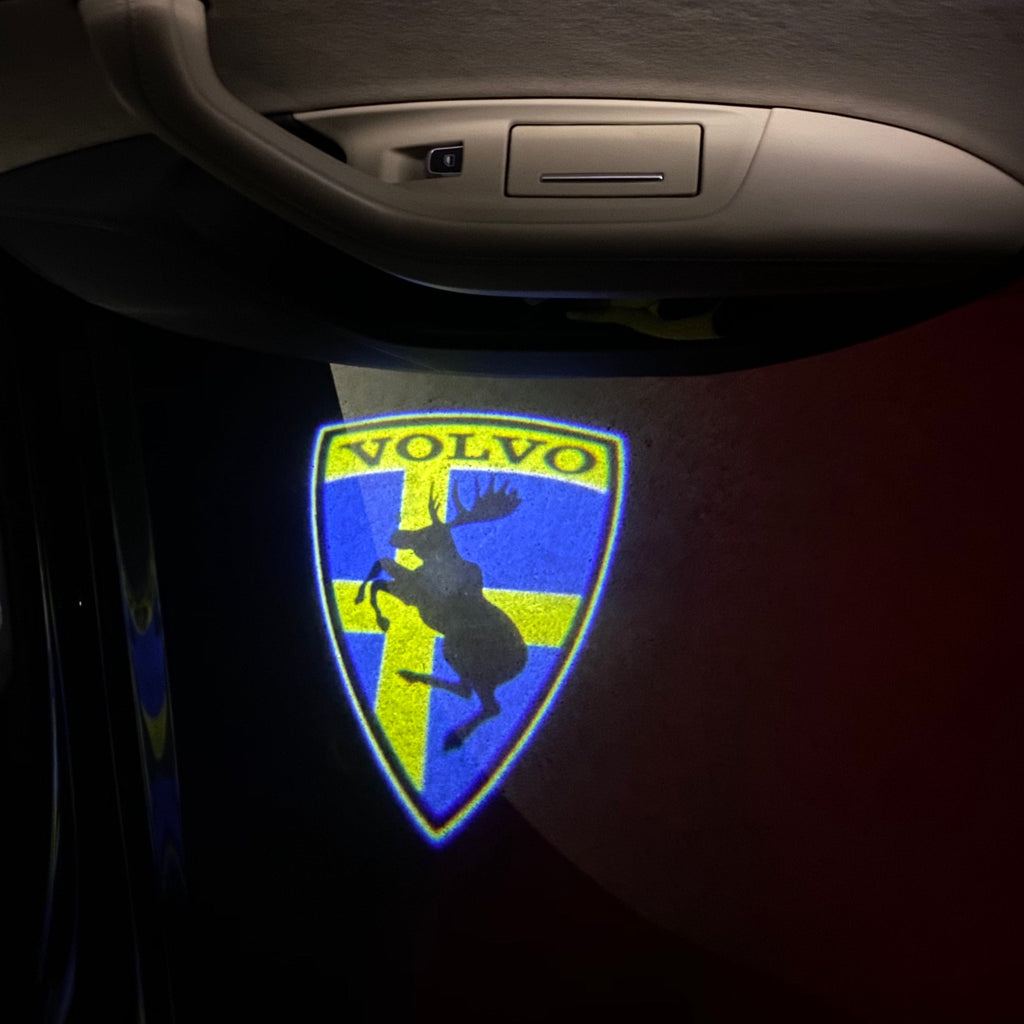 LUCES DEL PROYECTOR DEL LOGOTIPO Volvo Nr.66 (cantidad 1 = 2 Película de logotipo / 2 luces de puerta)