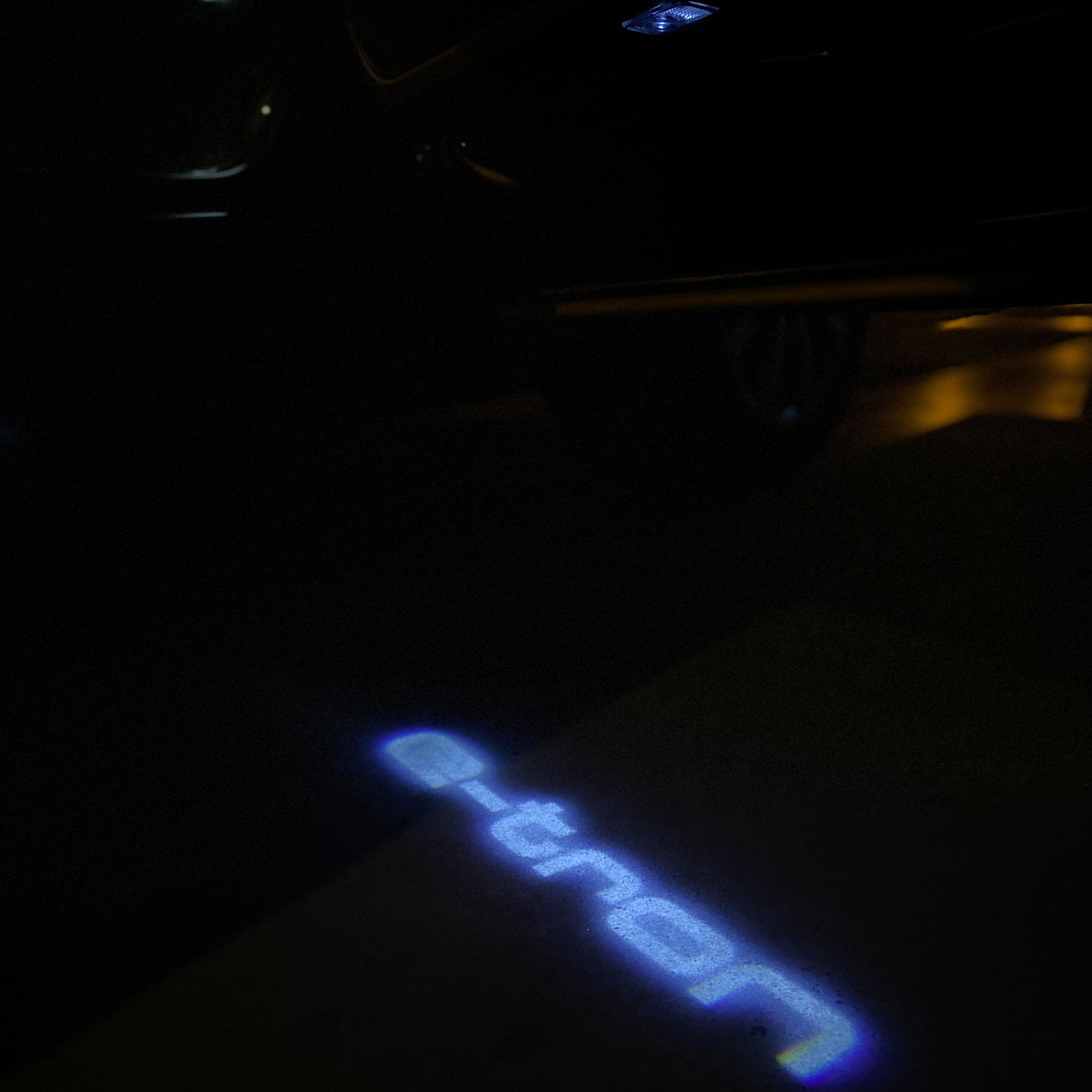 AUDI LOGO PROJECTOT LIGHTS Nr.19 (الكمية 1 = 2 Logo Films /2 أضواء الباب)