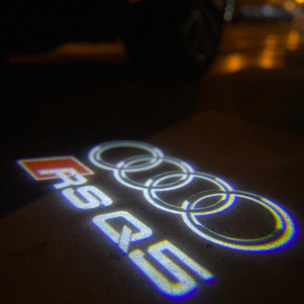 AUDI LOGO PROJECTOT LIGHTS Nr.19 (الكمية 1 = 2 Logo Films /2 أضواء الباب)