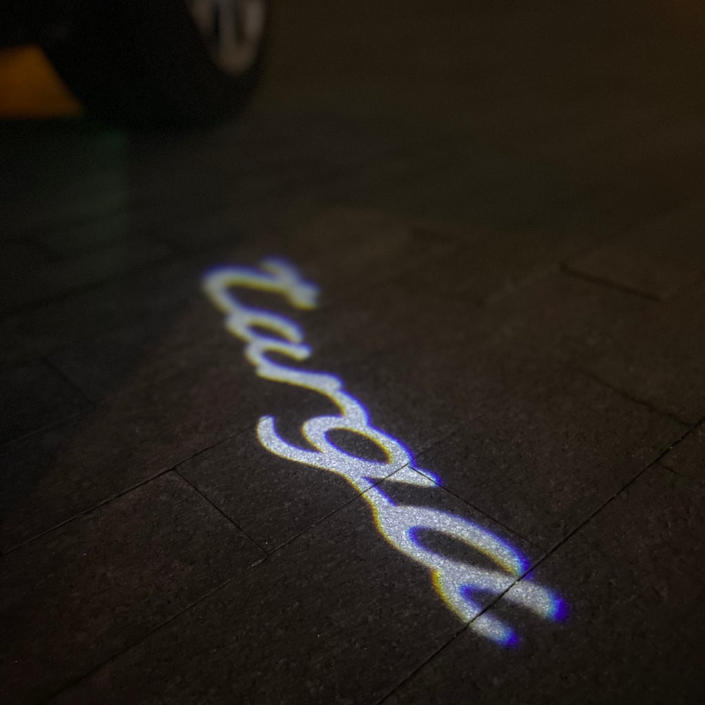 PROJECTEUR PORSCHE LOGO LUMIÈRES Nr.68 (quantité 1 = 2 Film Logo / 2 lumières de porte)