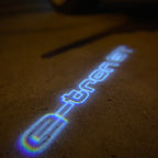 AUDI LOGO PROJECTOT LIGHTS Nr.19 (الكمية 1 = 2 Logo Films /2 أضواء الباب)
