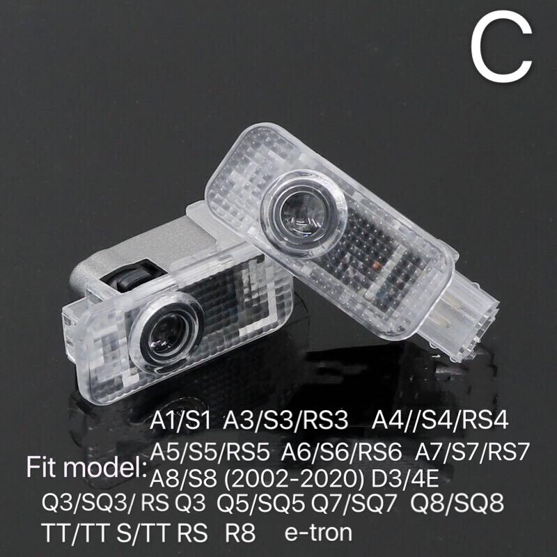 AUDI LOGO PROJECTOT LIGHTS Nr.25 (الكمية 1 = 2 Logo Films /2 أضواء الباب)