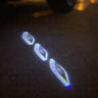 Maserati LOGO PROJECROTR LIGHTS Nr.01 (Anzahl 1 = 1 Sets / 2 Türleuchten)