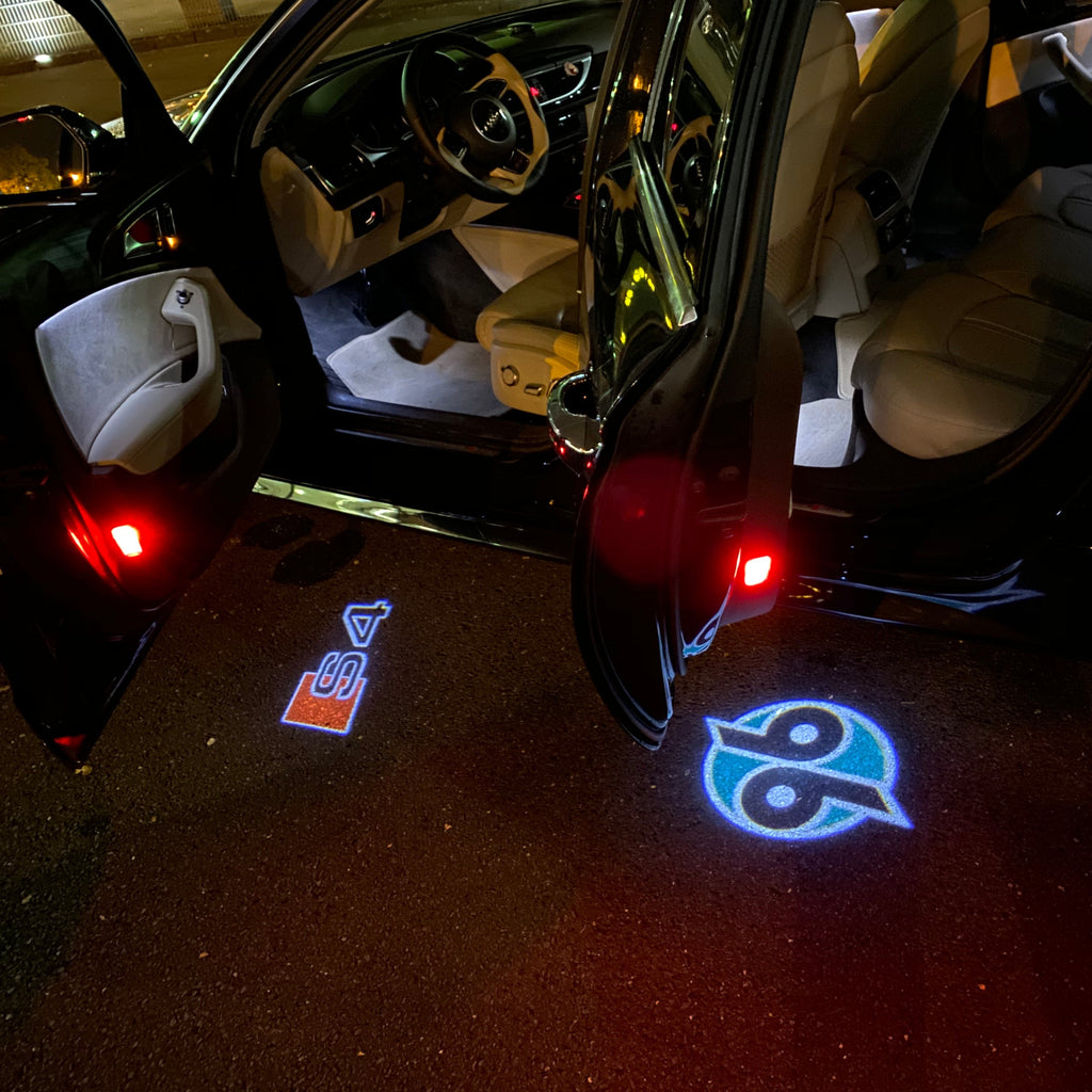 AUDI LOGO PROJECTOT LIGHTS Nr.19 (الكمية 1 = 2 Logo Films /2 أضواء الباب)