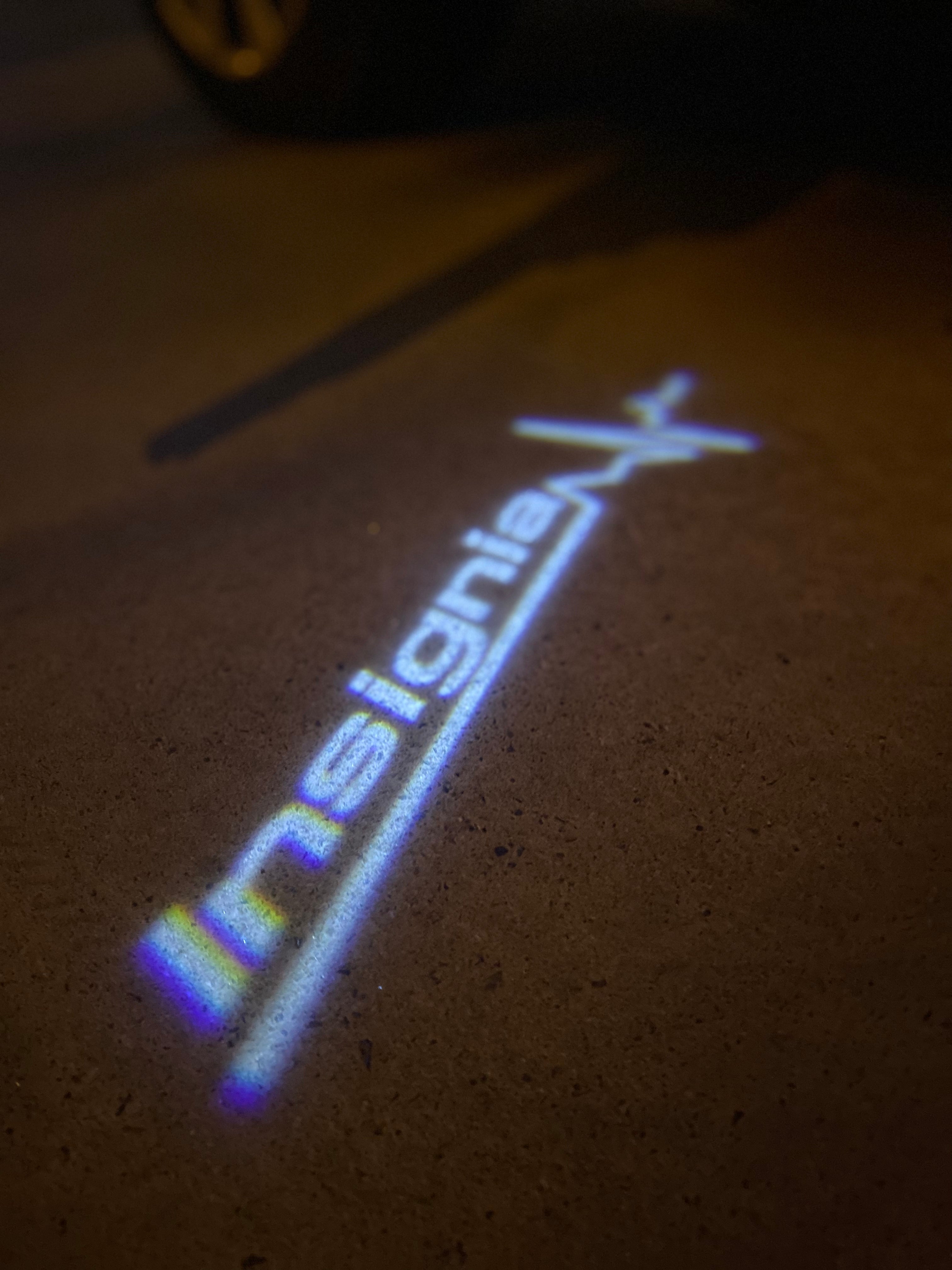 أوبل INSignia LOGO PROJECROTR أضواء Nr.01 (كمية 1 = 1 مجموعات / 2 أضواء الباب)