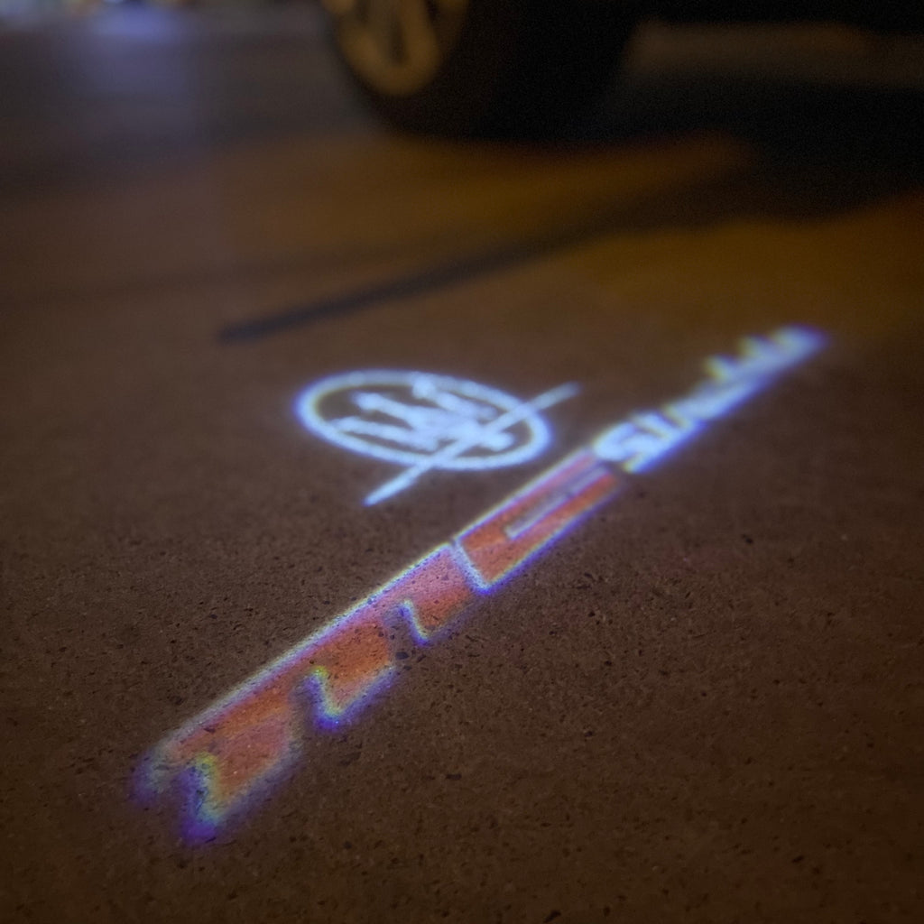 Maserati LOGO PROJECROTR LIGHTS Nr.01 (Anzahl 1 = 1 Sets / 2 Türleuchten)