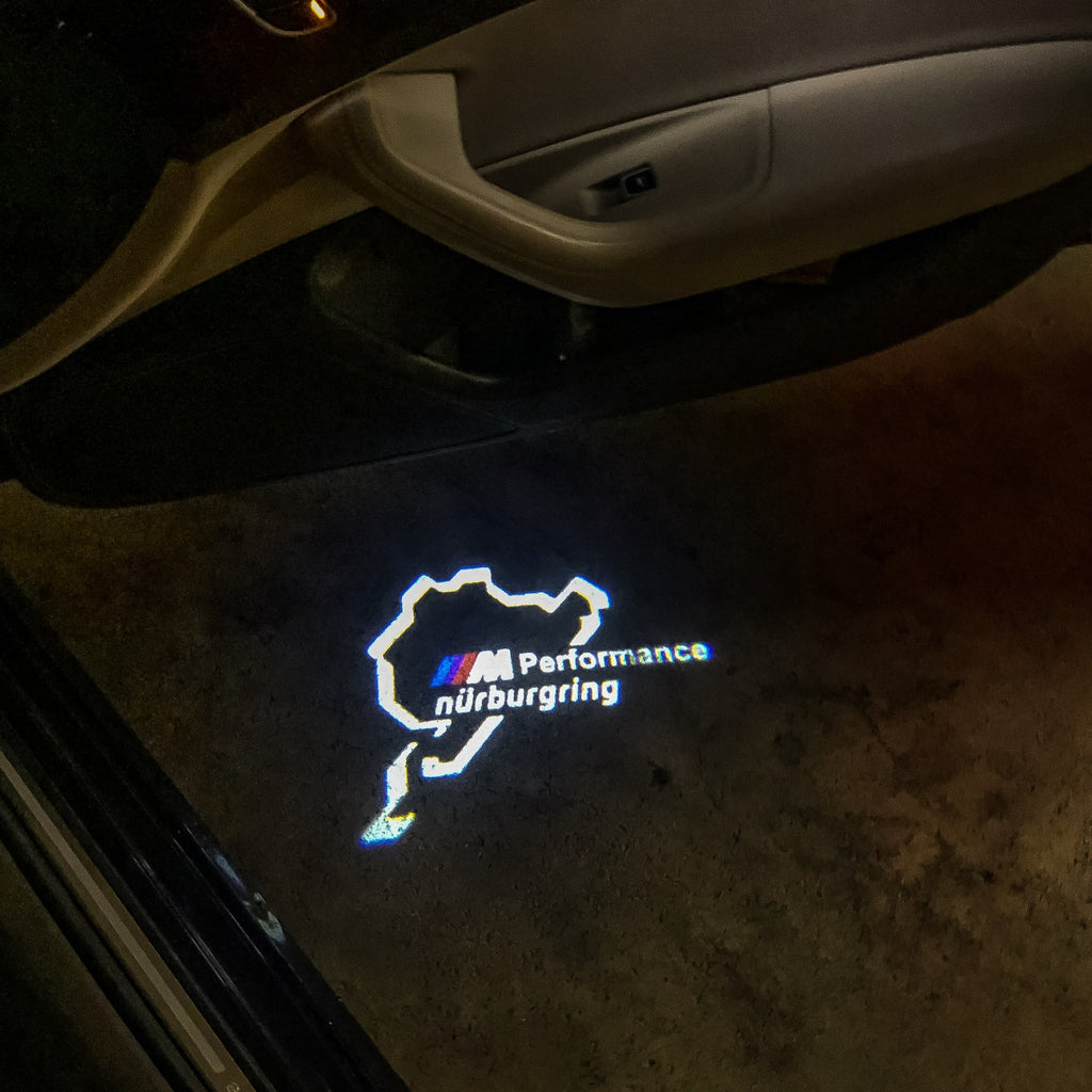 BMW M PERFORMANCE NÜBURGRING LOGO PROJEKTORLEUCHTEN Nr.09 (Anzahl 1 = 1 Sätze / 2 Türleuchten)