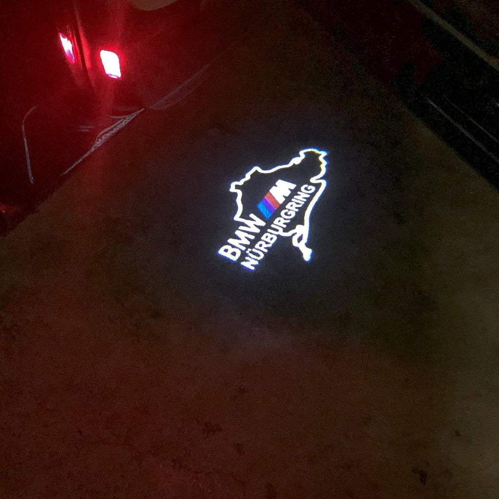 LUCI PROIETTORI CON LOGO BMW NÜRBURGRING Nr.08 (quantità 1 = 1 set / 2 luci porta)