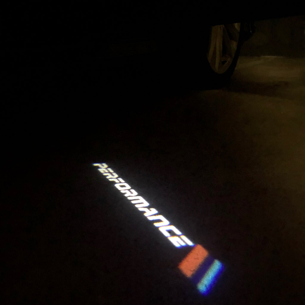 LUCI PROIETTORI CON LOGO BMW Nr.15 (quantità 1 = 1 set / 2 luci porta)