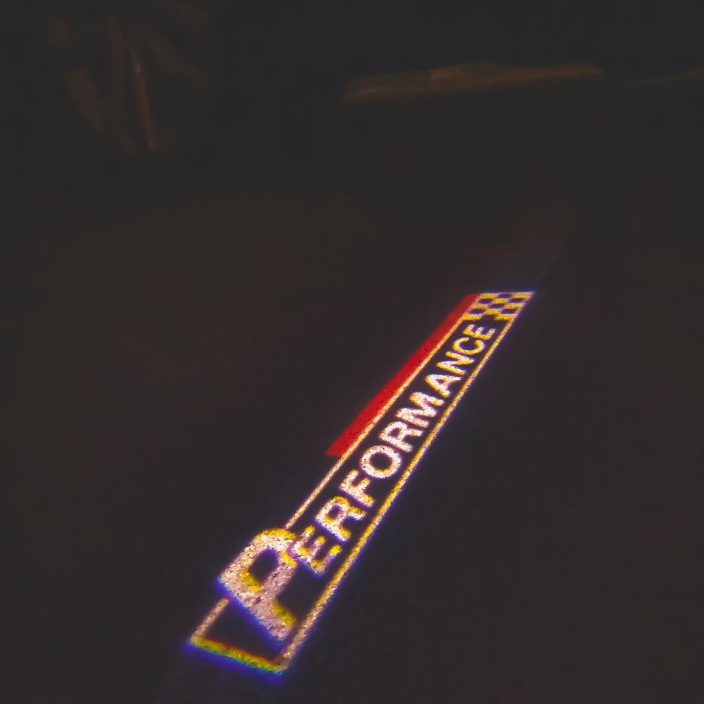 ÉCLAIRAGE DE PROJECTEUR BMW PERFORMANCE LOGO Nr.22 (quantité 1 = 1 jeux / 2 feux de porte)