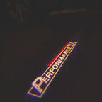 ÉCLAIRAGE DE PROJECTEUR BMW PERFORMANCE LOGO Nr.22 (quantité 1 = 1 jeux / 2 feux de porte)