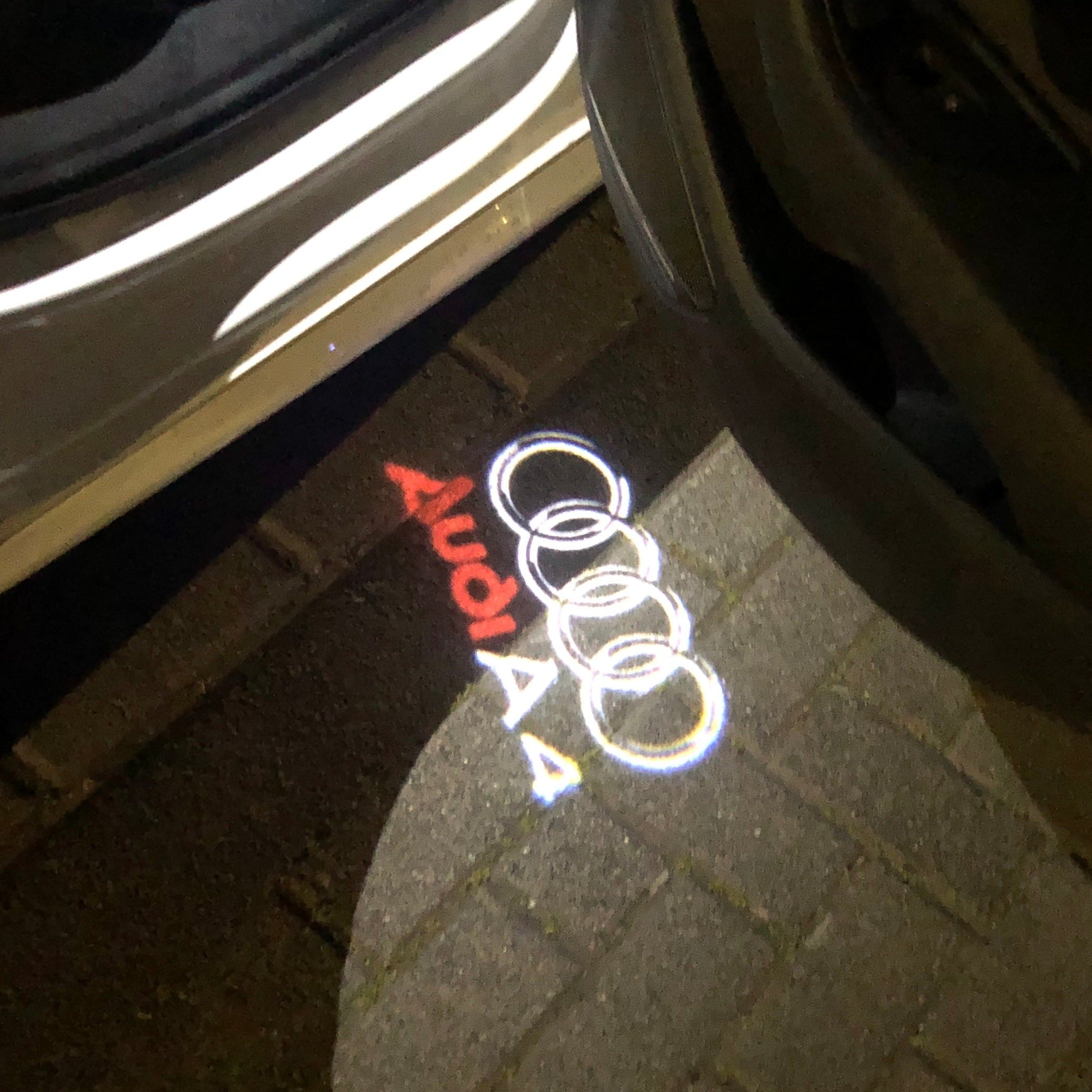 AUDI LOGO PROJECTOT LIGHTS Nr.42 (الكمية 1 = 2 شعار الأفلام / 2 أضواء الباب)