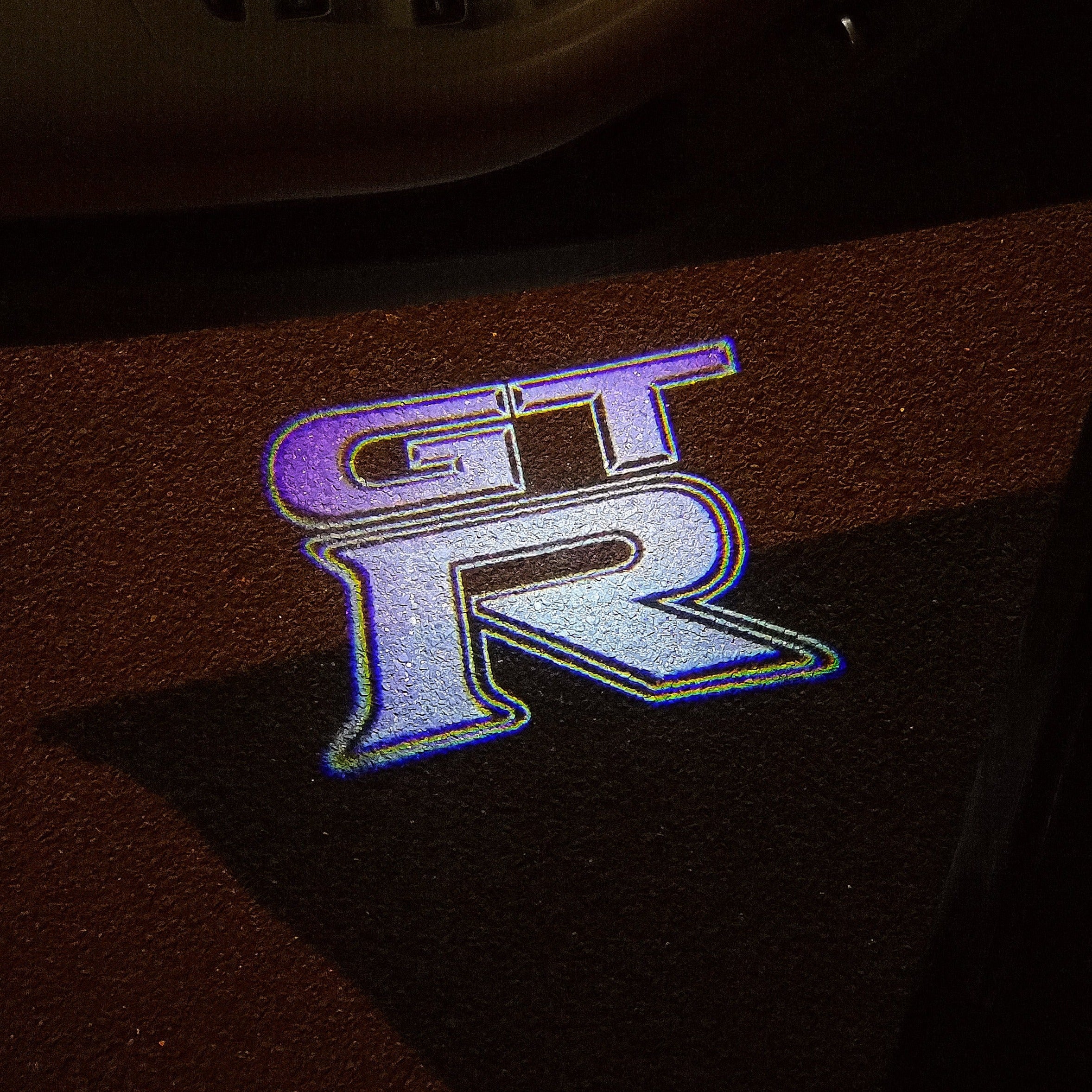 LUCI PROIETTORI LOGO GTR-R35 Nr.05 (quantità 1 = 2 Pellicole Logo / 2 luci porta)