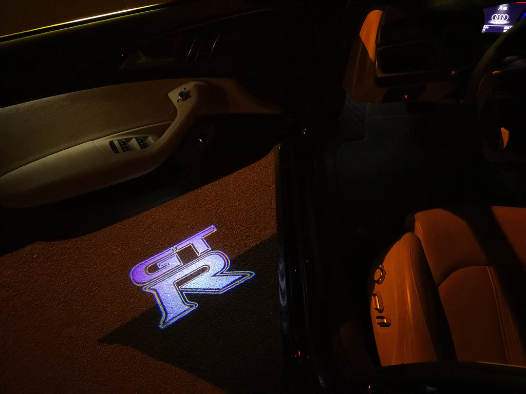 LUCI PROIETTORI LOGO GTR-R35 Nr.05 (quantità 1 = 2 Pellicole Logo / 2 luci porta)