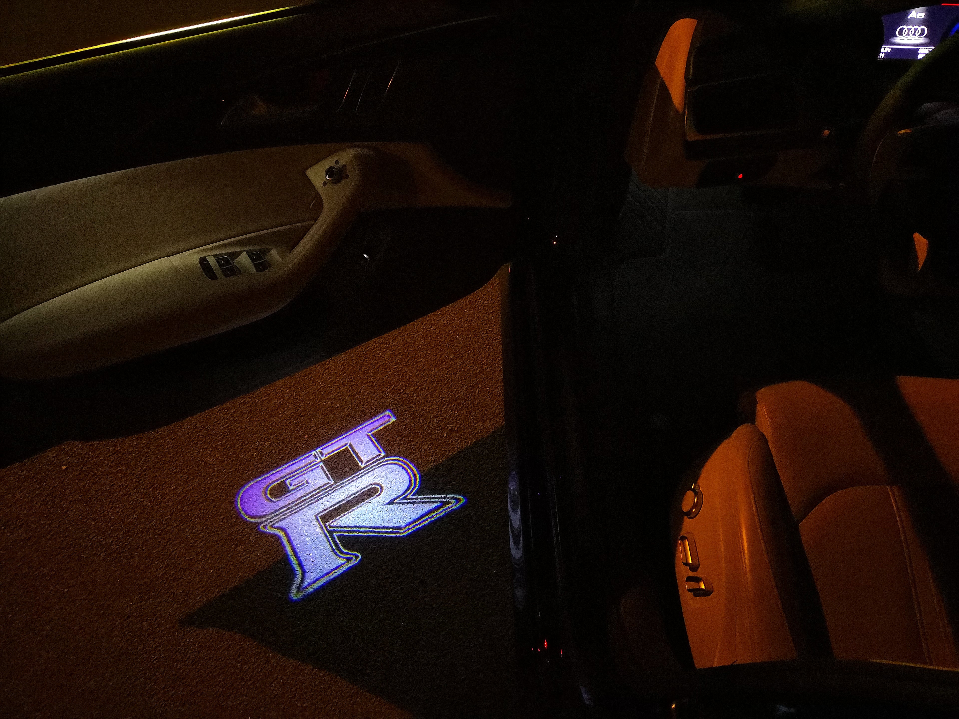 LUCI PROIETTORI LOGO GTR-R35 Nr.05 (quantità 1 = 2 Pellicole Logo / 2 luci porta)