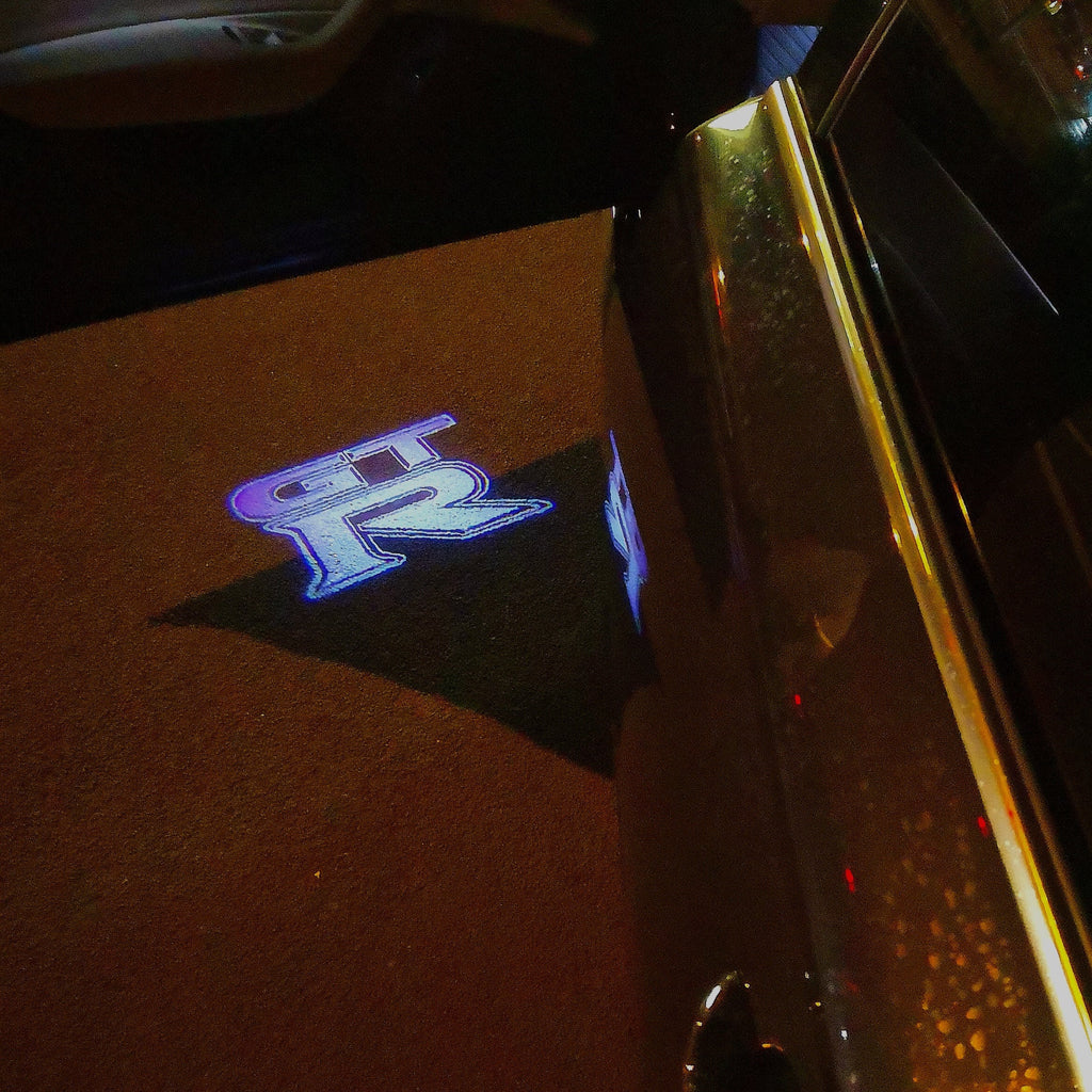 LUCI PROIETTORI LOGO GTR-R35 Nr.05 (quantità 1 = 2 Pellicole Logo / 2 luci porta)