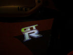 GTR-R35 LOGO PROJECTOT LIGHTS Nr.07 (quantità 1 = 2 Pellicole logo /2 luci porta)
