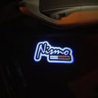 LUCI PROIETTORI LOGO NISMO Nr.10 (quantità 1 = 2 Pellicole Logo / 2 luci porta)