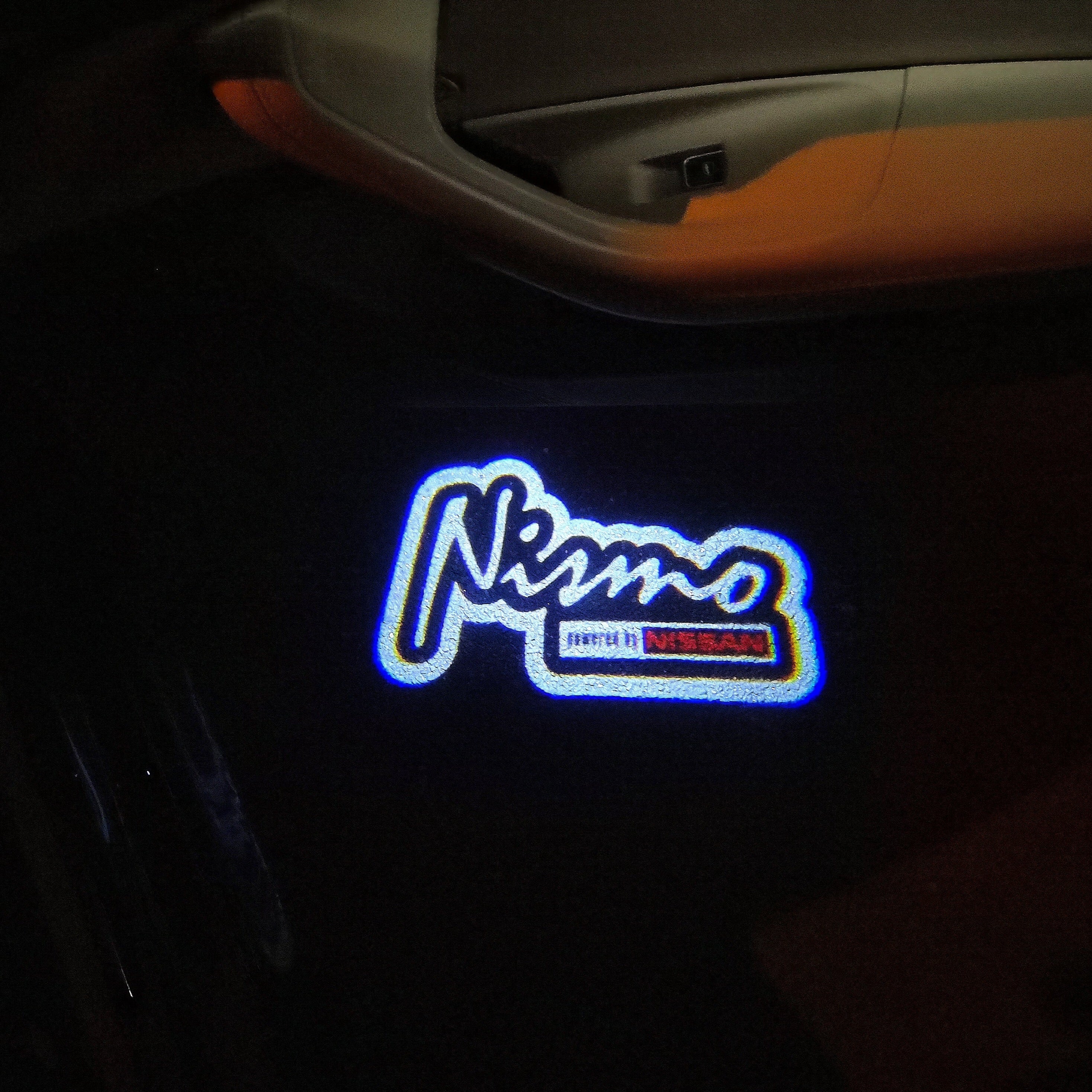 LUCI PROIETTORI LOGO NISMO Nr.10 (quantità 1 = 2 Pellicole Logo / 2 luci porta)