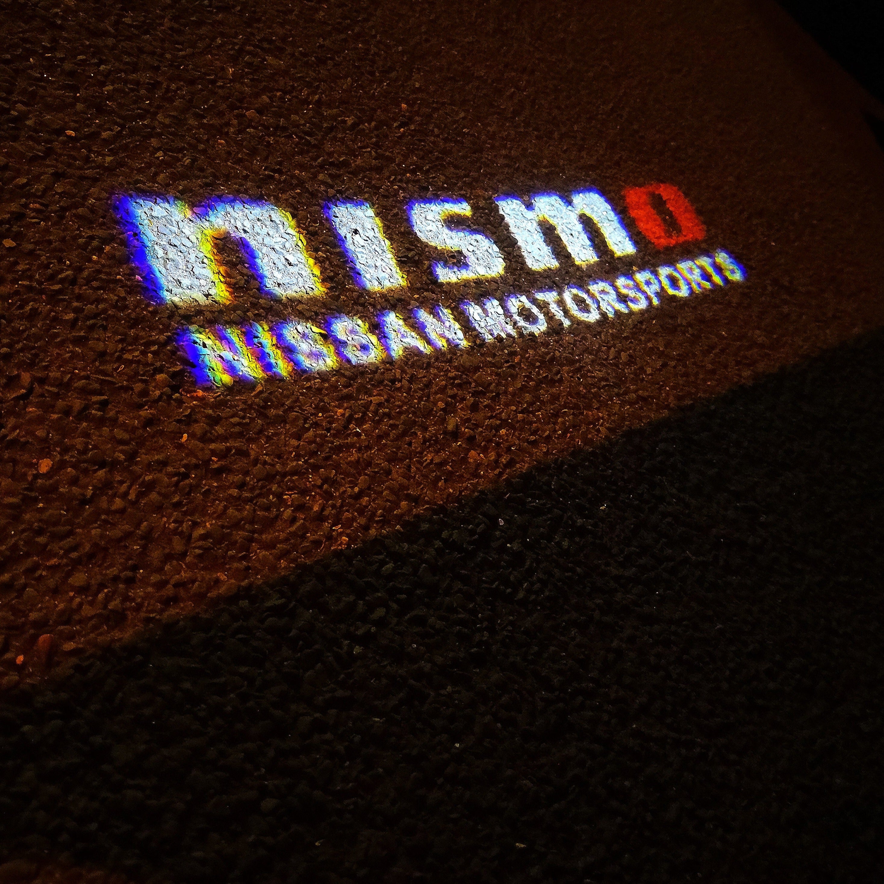 GTR-R35 NISMO LOGO PROJECTOT LIGHTS Nr.13(quantità 1 = 2 Pellicole logo /2 luci porta)