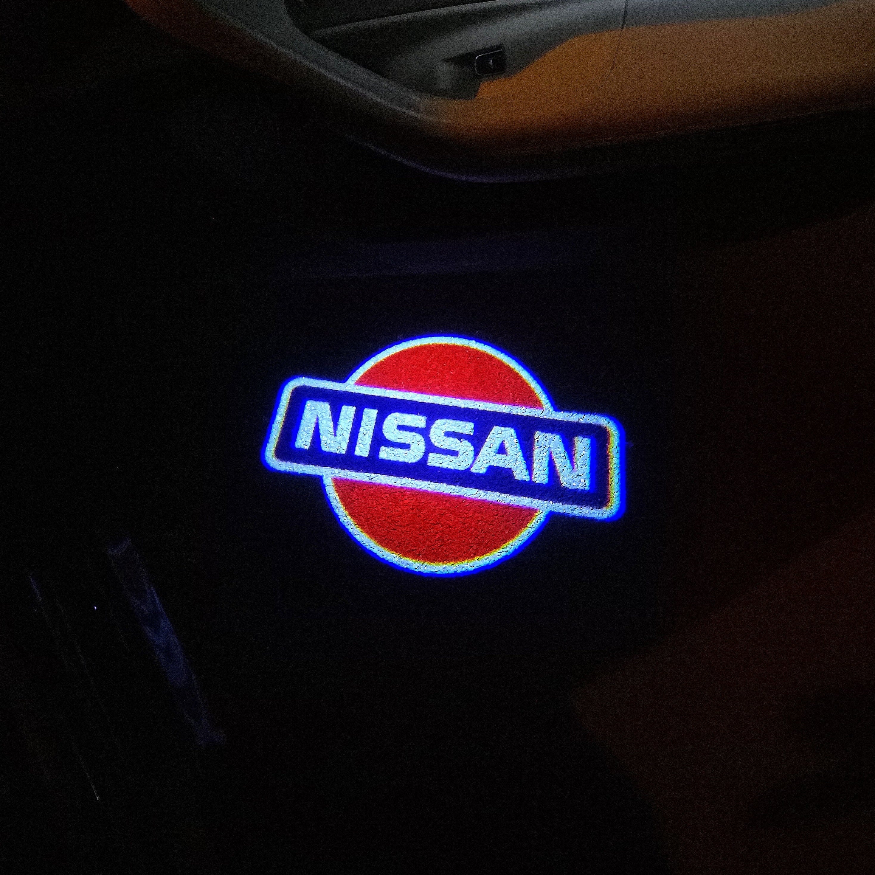 NISSAN PROJECTOT LIGHTS Nr.14(quantità 1 = 2 Pellicole logo /2 luci porta)