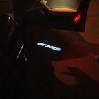 LUCI PROIETTORI LOGO ORIGINALI PORSCHE Nr.03 (quantità 1 = 2 Logo Film / 2 luci porta)