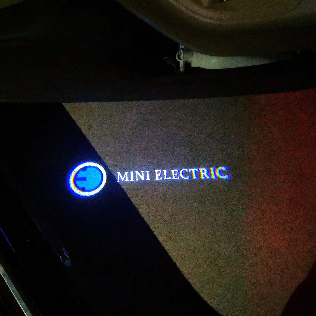 MINI ELECTRIC LOGO PROJECTOR LIGHTS Nr.62 (الكمية 1 = 2 شعار فيلم / 2 باب)