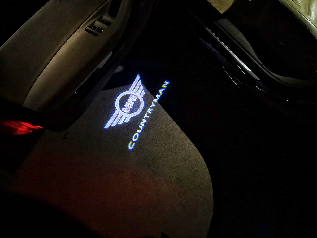 MINI COUNTRYMAN LOGO PROJECROTR LIGHTS Nr.141 (الكمية 1 = 2 شعار فيلم / 2 مصباح باب)