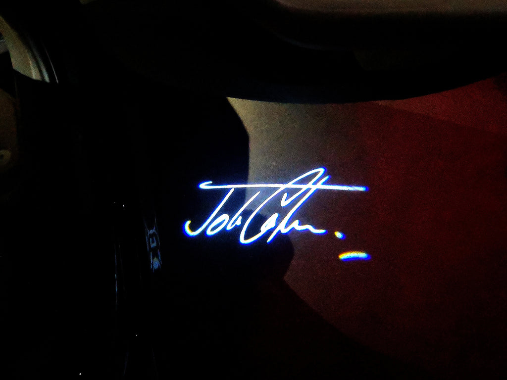 LUCI PROIETTORI LOGO JOHN COOPER Nr.82 (quantità 1 = 2 Logo Film / 2 luci porta)