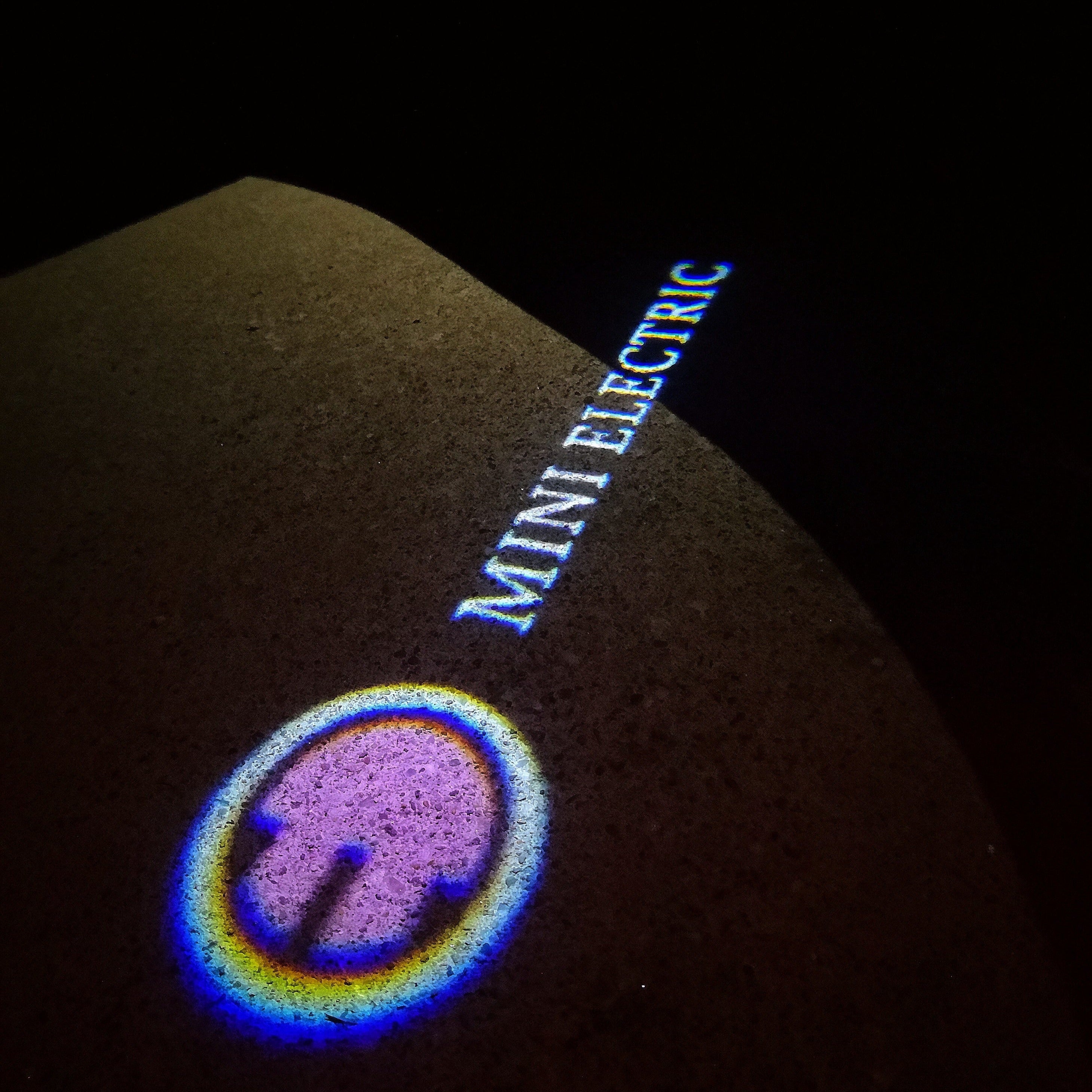MINI ELECTRIC LOGO PROJECTOR LIGHTS Nr.61 (الكمية 1 = 2 شعار فيلم / 2 باب)