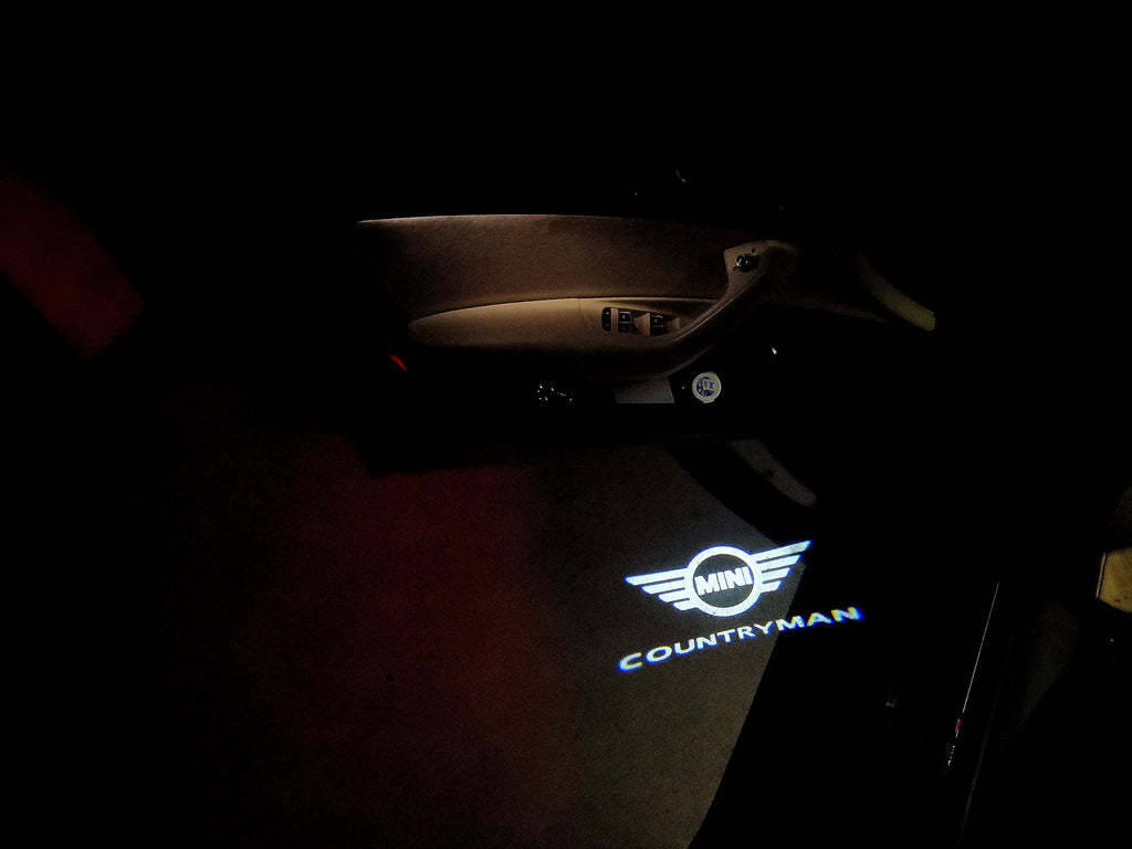 LUCES DE PROYECTOR CON LOGO DE COUNTRYMAN Nr.136 (cantidad 1 = 2 Película de Logo / 2 luces de puerta)