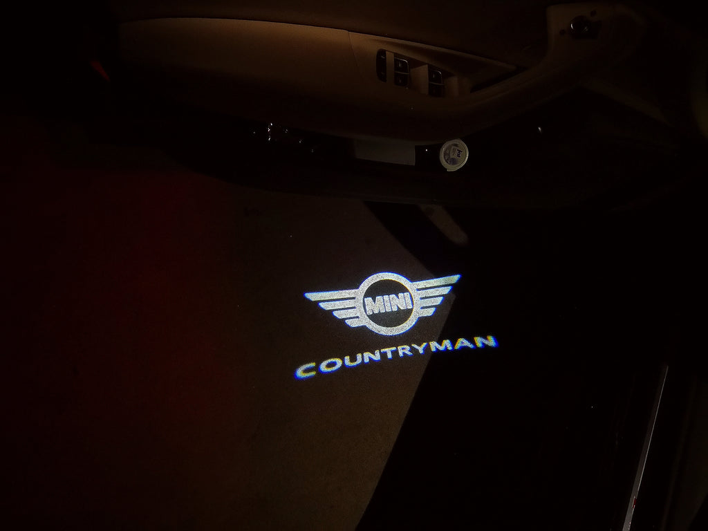 LUCES DE PROYECTOR CON LOGO DE COUNTRYMAN Nr.136 (cantidad 1 = 2 Película de Logo / 2 luces de puerta)