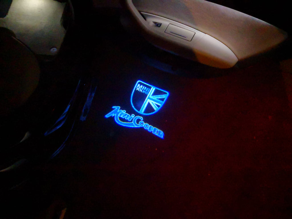 LUCI PROIETTORI MINI COOPER LOGO Nr.43 (quantità 1 = 2 Logo Film / 2 luci porta)