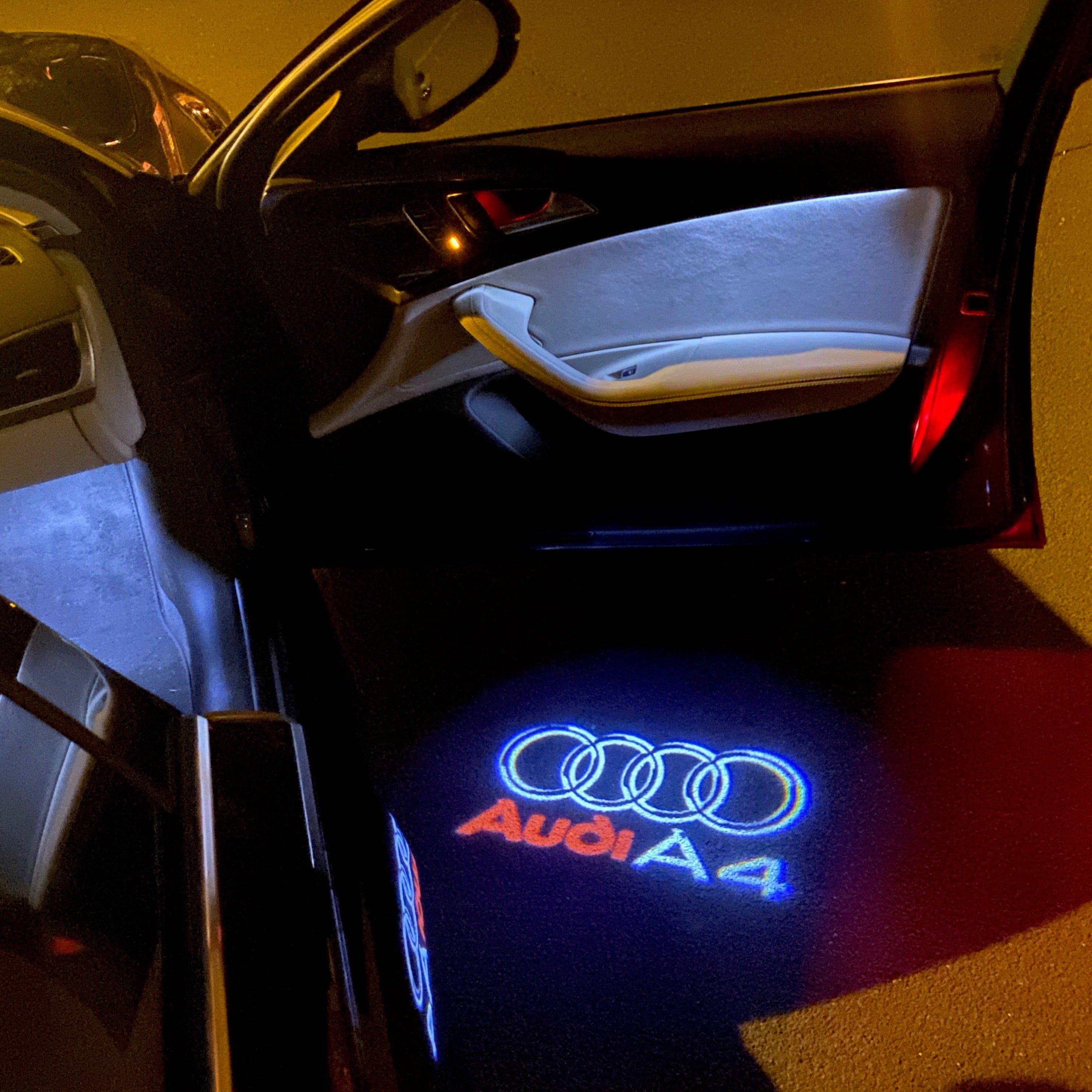 AUDI LOGO PROJECTOT LIGHTS Nr.42 (الكمية 1 = 2 شعار الأفلام / 2 أضواء الباب)