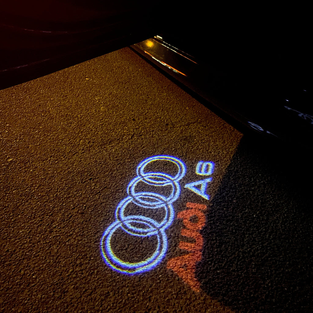 AUDI LOGO PROJECTOT LIGHTS Nr.44 (Menge 1 = 2 Logofolien /2 Türleuchten)