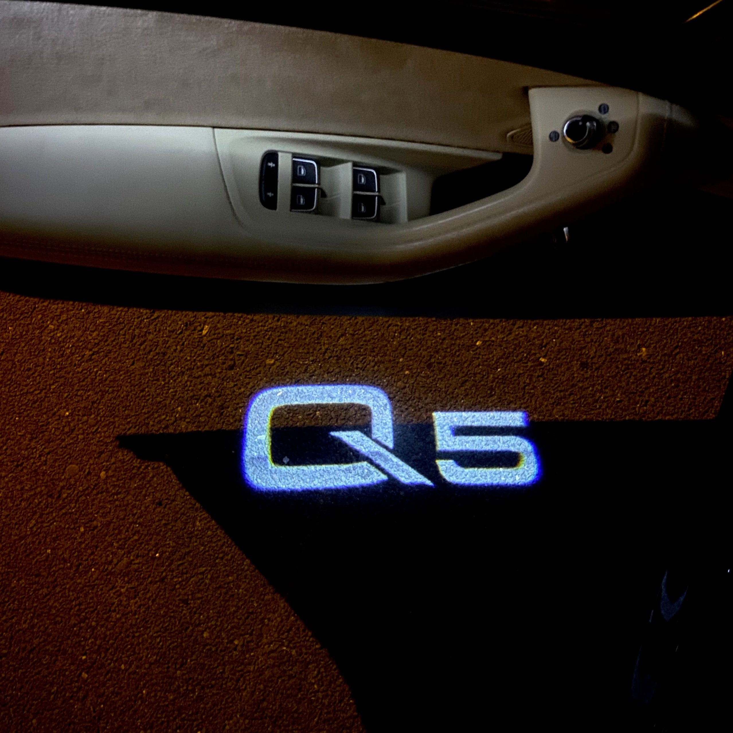 AUDI LOGO PROJECTOT LIGHTS Nr.101 (الكمية 1 = 2 Logo Films /2 أضواء الباب)