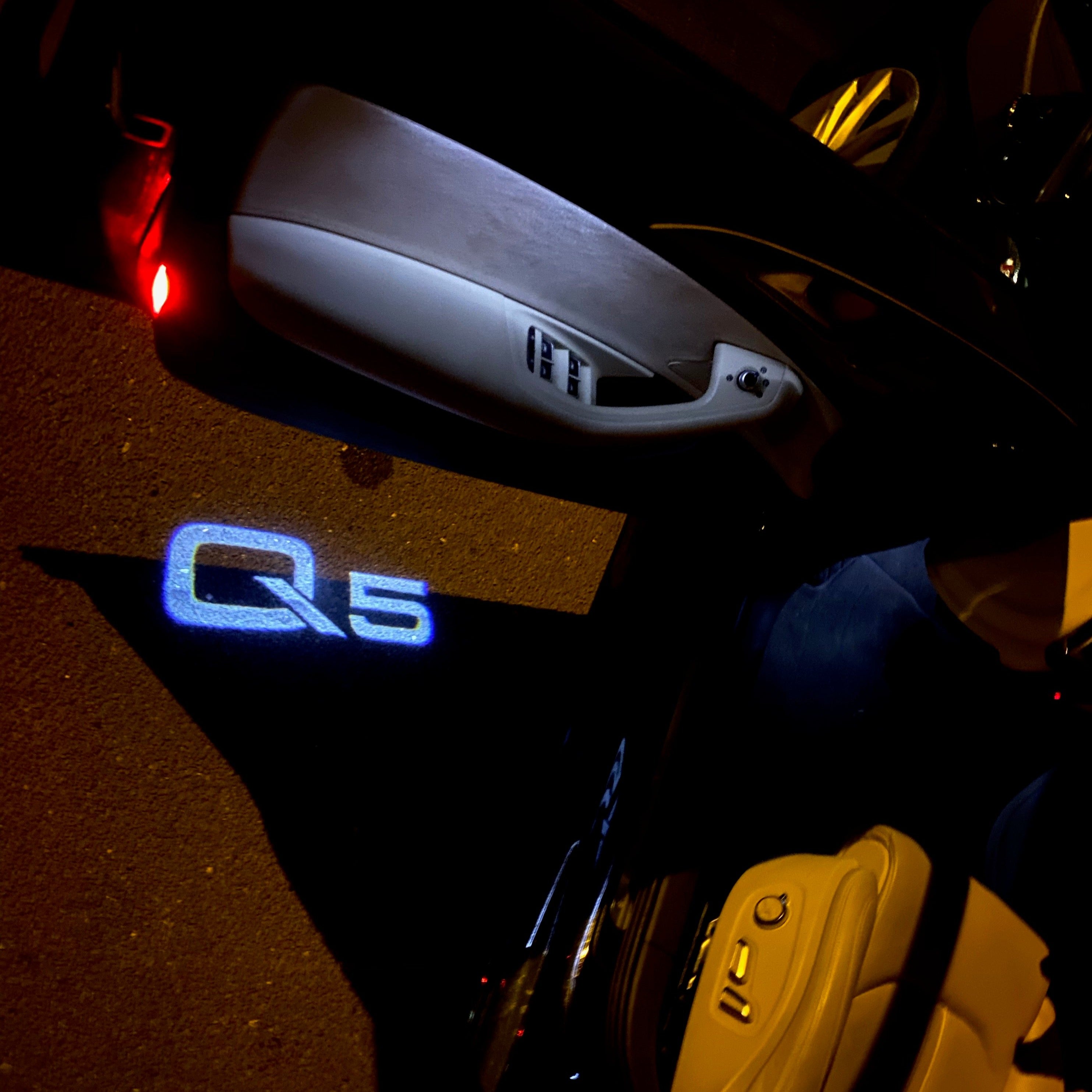 AUDI LOGO PROJECTOT LIGHTS Nr.101 (الكمية 1 = 2 Logo Films /2 أضواء الباب)
