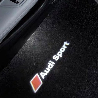 AUDI LOGO PROJECTOT LIGHTS Nr.69 (الكمية 1 = 2 Logo Films /2 أضواء الباب)
