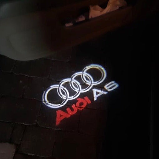 AUDI LOGO PROJECTOT LIGHTS Nr.44 (Menge 1 = 2 Logofolien /2 Türleuchten)