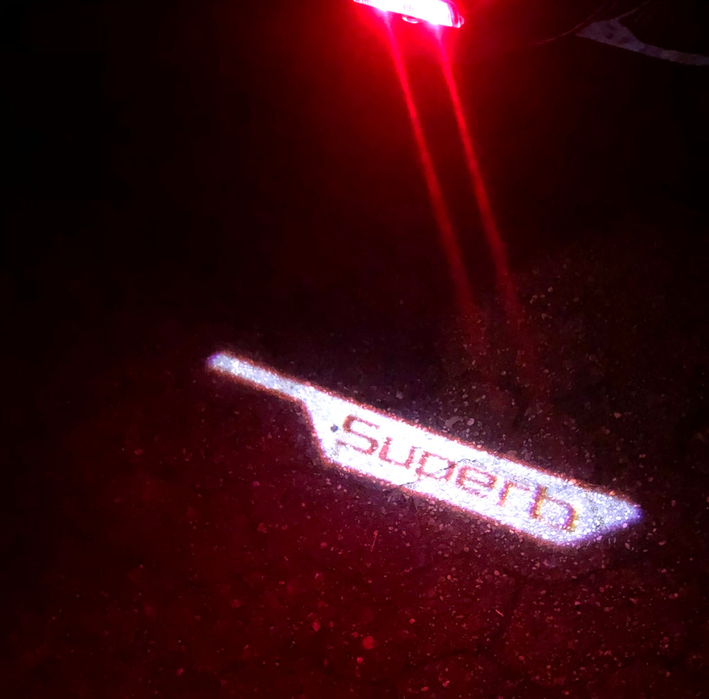 SKODA LOGO PROJECTOT LIGHTS Nr.70 (cantidad 1 = 2 logo película / 2 luces de puerta)