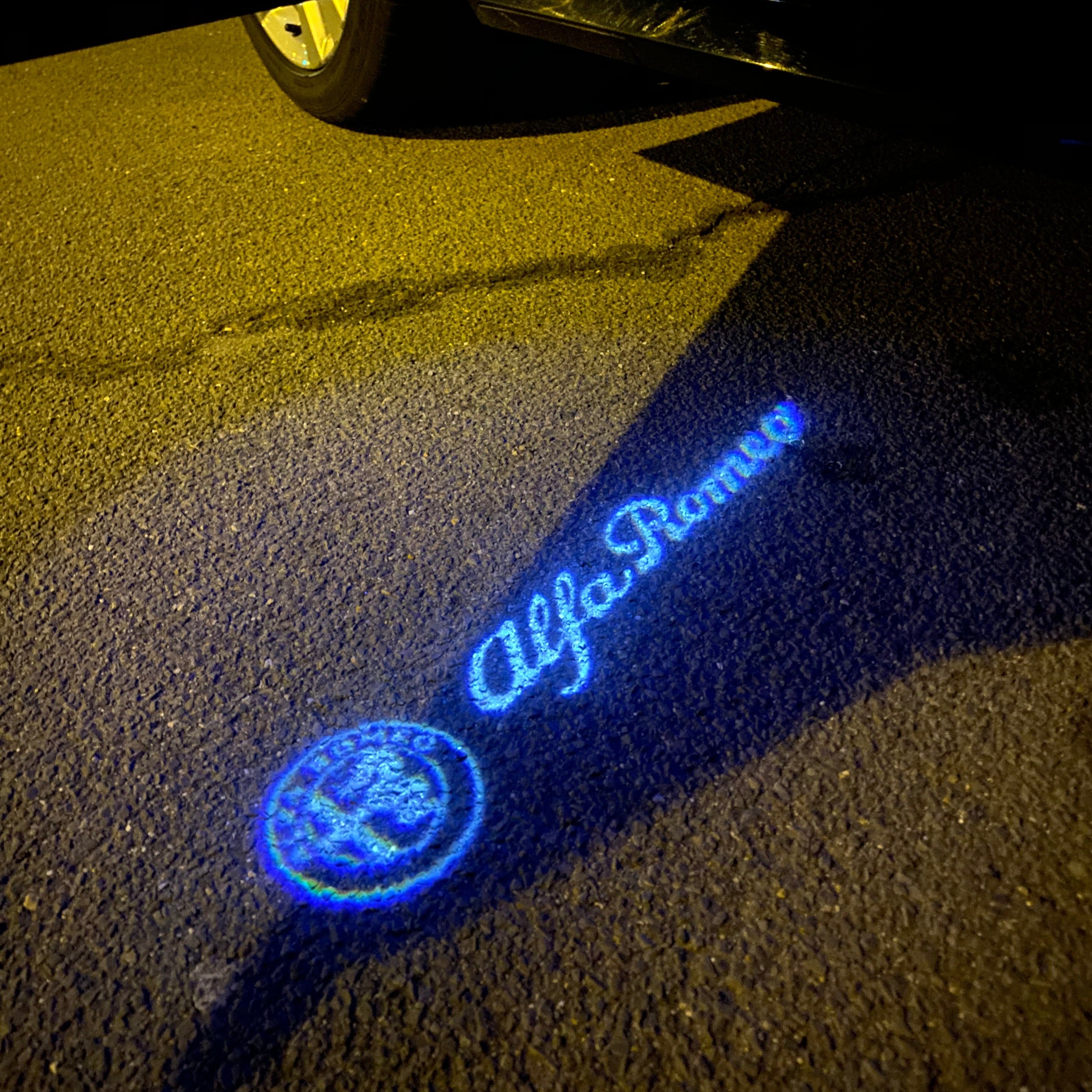LUCI PROIETTORI LOGO Alfa Romeo Nr.02 (quantità 1 = 2 Logo Film / 2 luci porte)