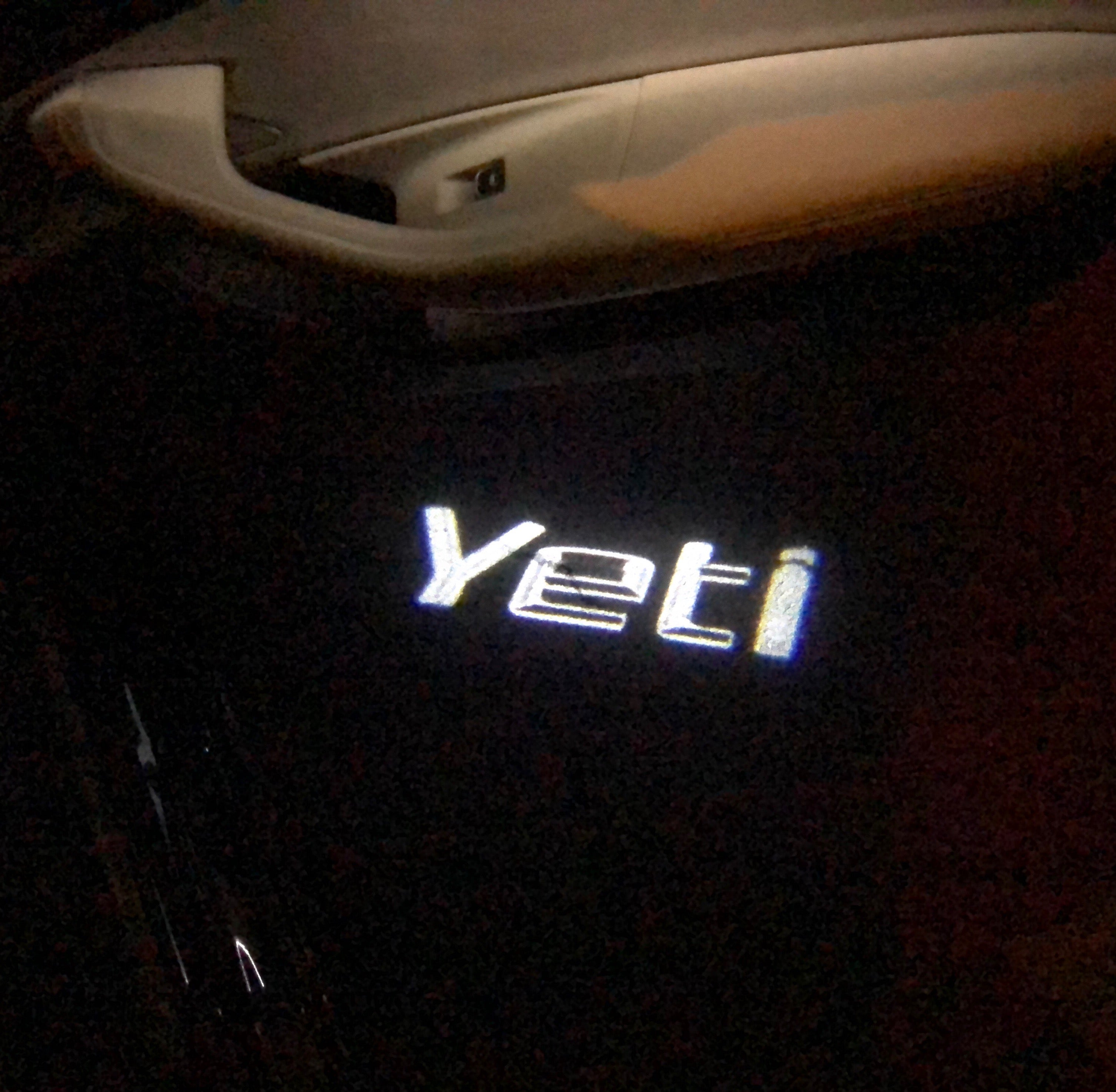SKODA YETI LOGO PROJECTOT LIGHTS Nr.64 (Menge 1 = 2 Logo Film / 2 Türleuchten)