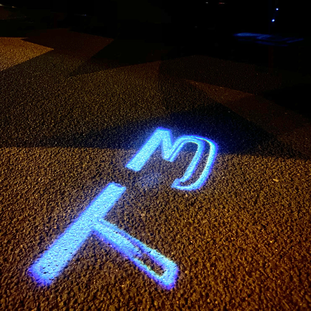 PROJECTEUR VOLVO LOGO LIGHTS Nr.130 (quantité 1 = 2 Film Logo / 2 feux de porte)