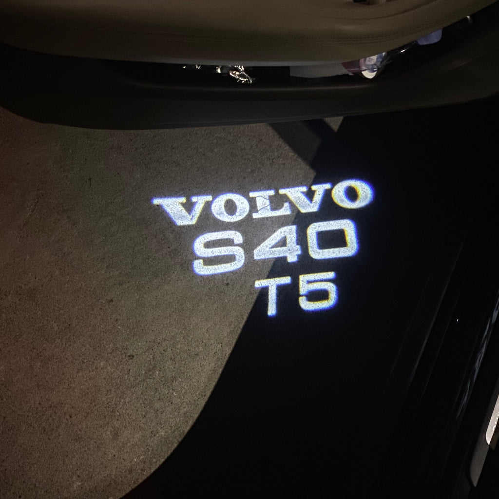LUCES DEL PROYECTOR DEL LOGOTIPO Volvo no 115 (cantidad 1 = 2 películas con logotipo / 2 luces de puerta)