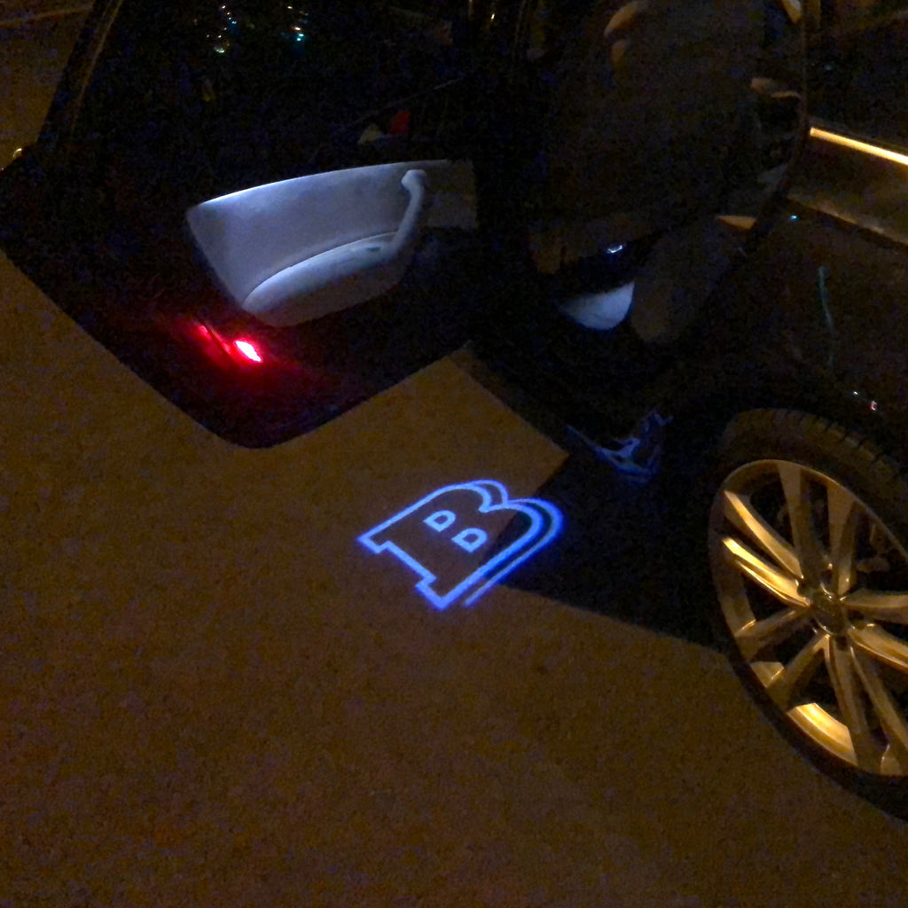 LUCI PROIETTORI LOGO MERCEDES BENZ BRABUS Nr.23 (quantità 1 = 1 set / 2 luci porta)