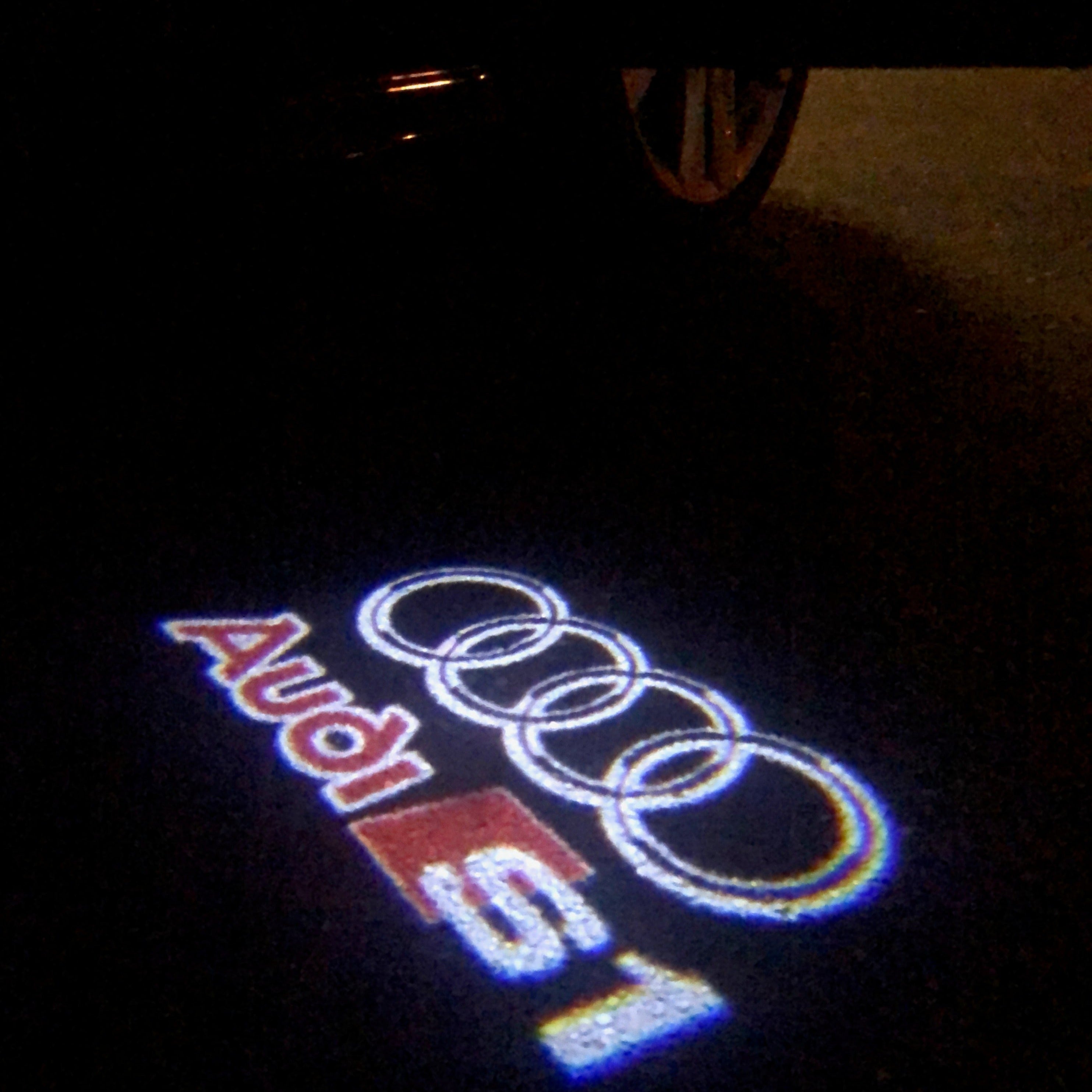 AUDI LOGO PROJECTOT LIGHTS Nr.32 (الكمية 1 = 2 شعار الأفلام / 2 أضواء الباب)