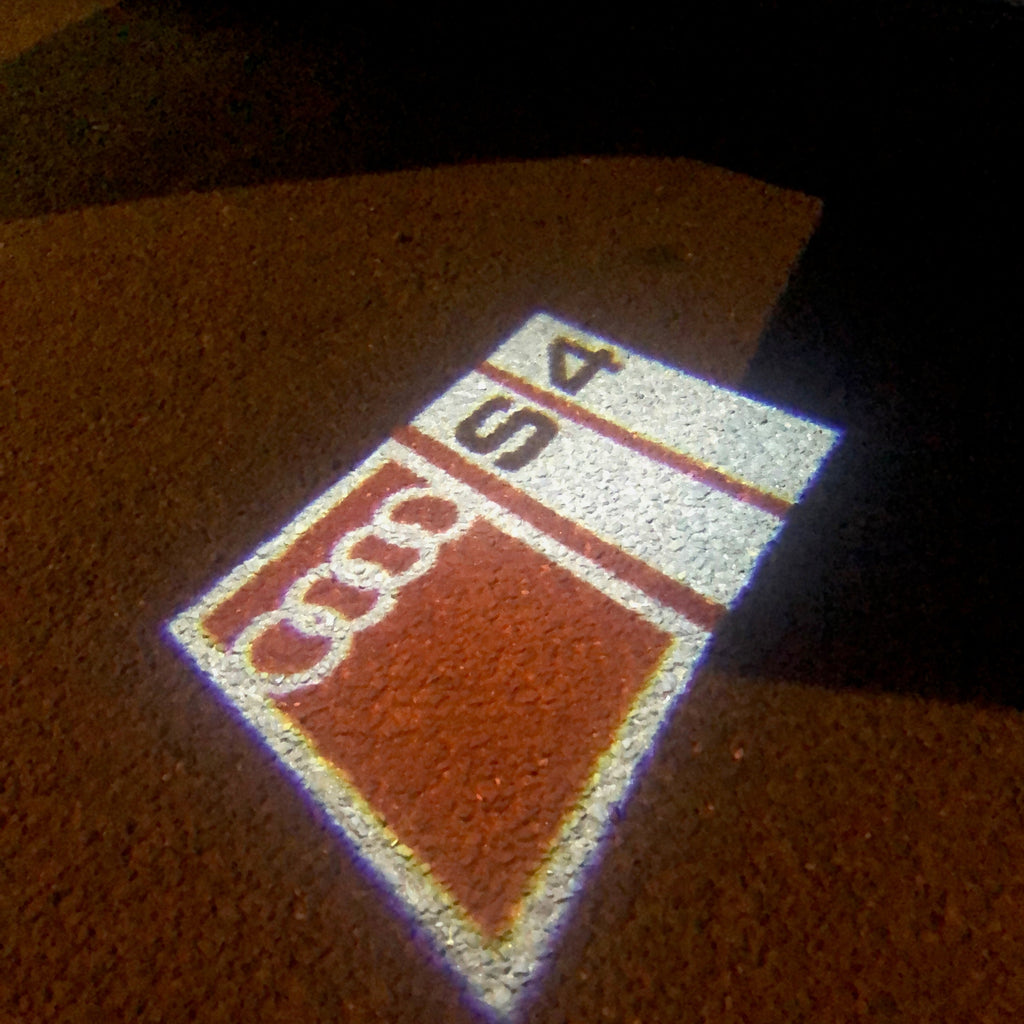 AUDI LOGO PROJECTOT LIGHTS Nr.151 (quantità 1 = 2 Logo Films /2 luci porta)