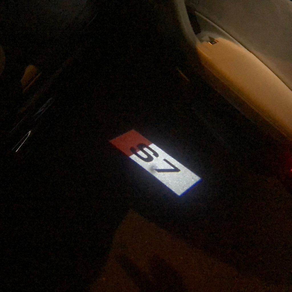 AUDI LOGO PROJECTOT LIGHTS Nr.134 (الكمية 1 = 2 Logo Films /2 أضواء الباب)