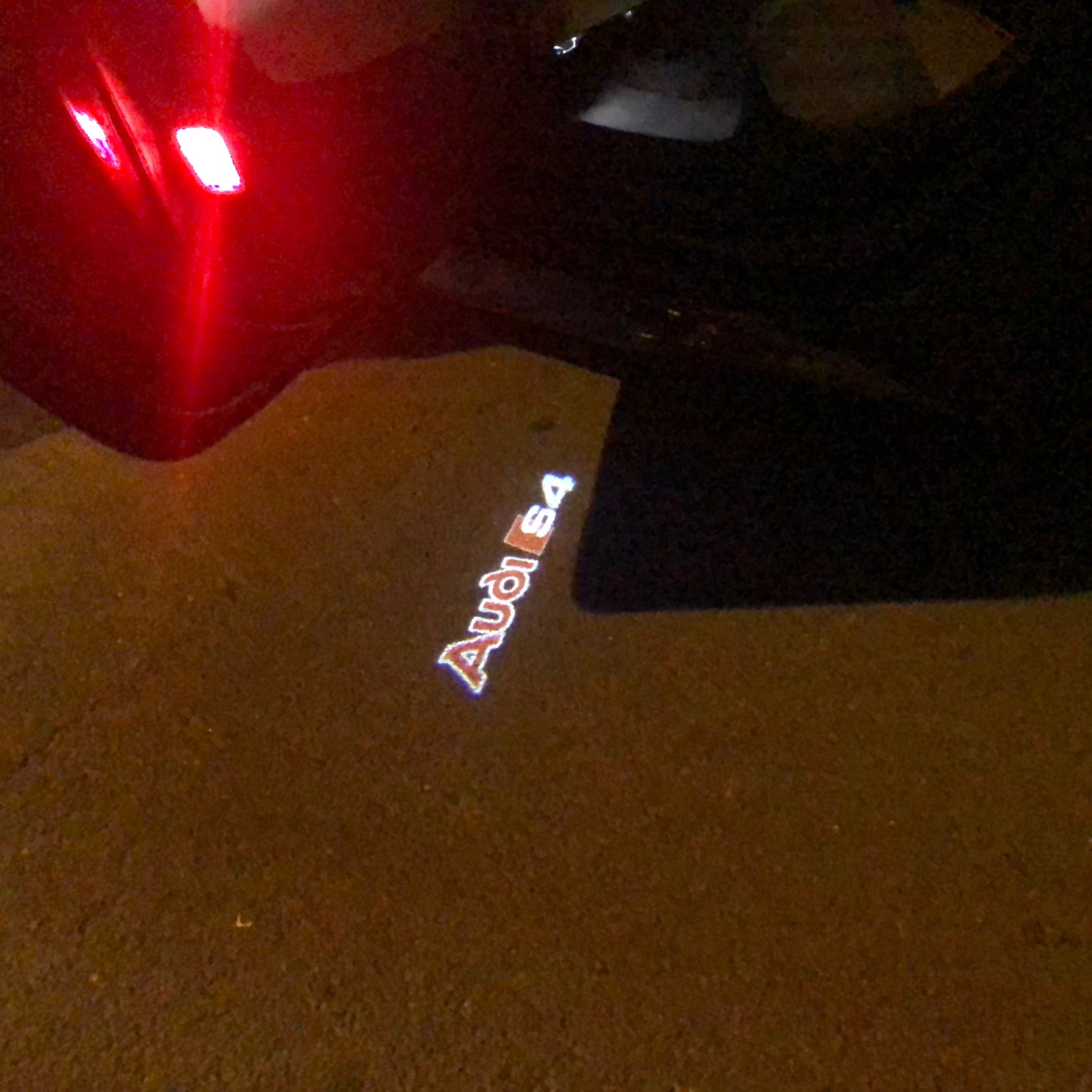 AUDI LOGO PROJECTOT LIGHTS Nr.88 (الكمية 1 = 2 Logo Films /2 أضواء الباب)