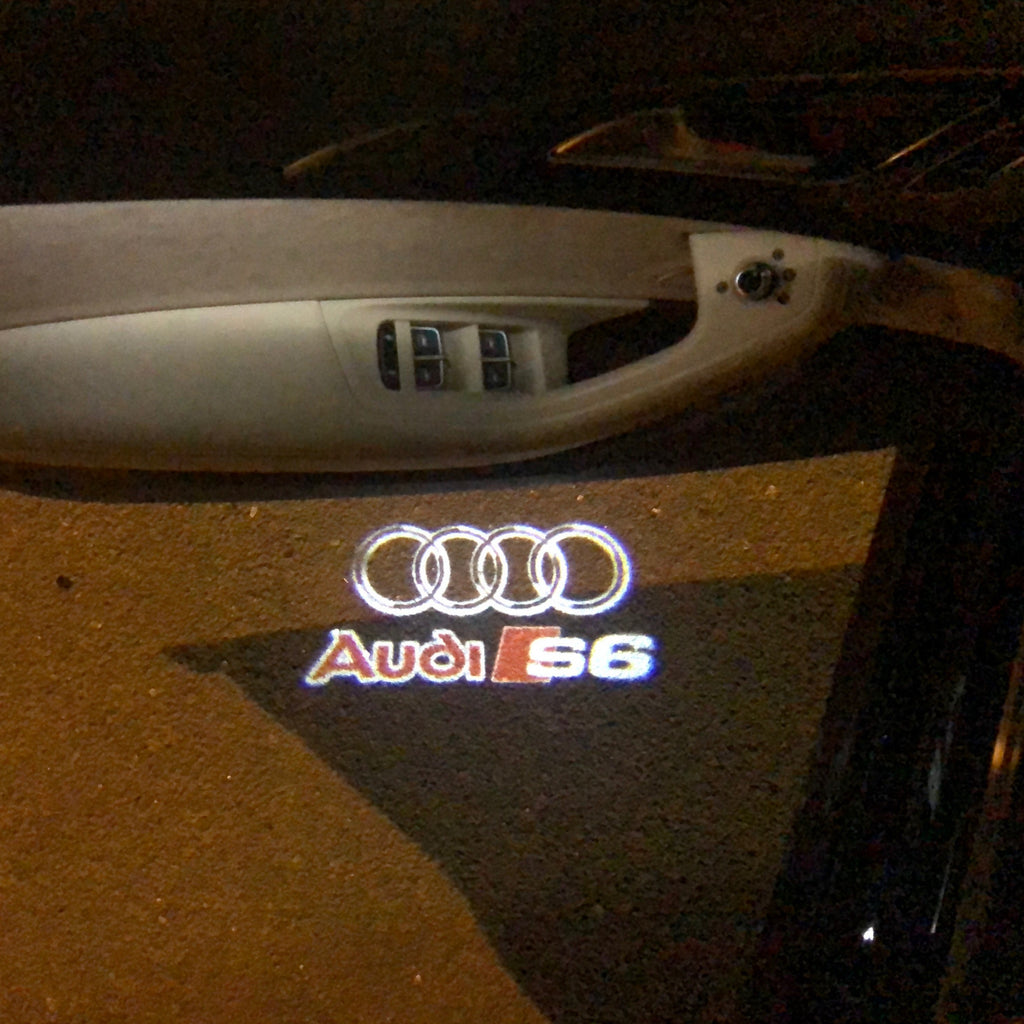 AUDI LOGO PROJECTOT LIGHTS Nr.36 (الكمية 1 = 2 شعار الأفلام / 2 أضواء الباب)